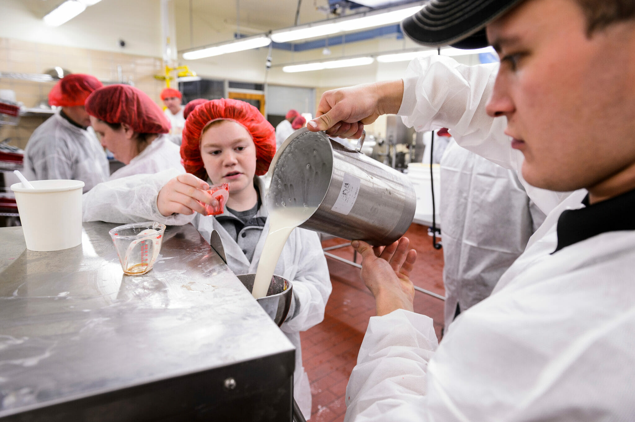 participants prepare a batch of ice cream