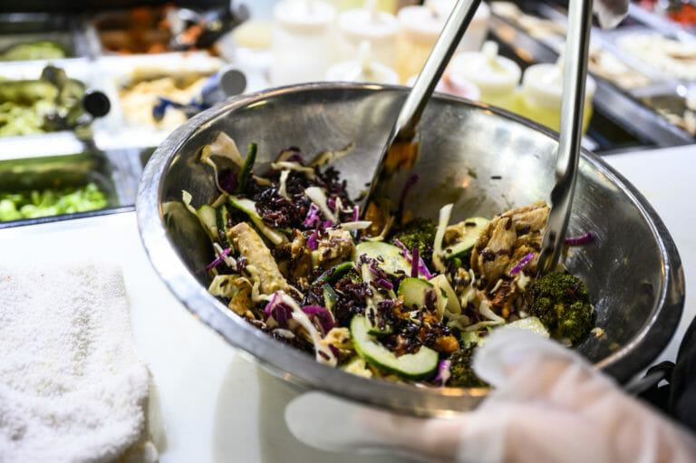 Forage Kitchen staff prepare freshly-made and healthy fast food for patrons